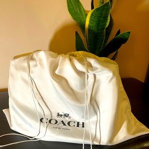 Black Coach Leather Bag with Gold strap. With certificate of authenticity